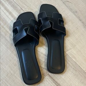 Hermes Black Leather Slide Sandals with White Stitching